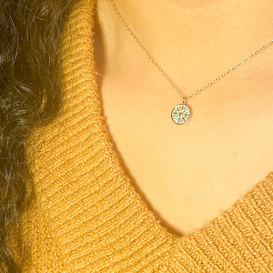 
                  
                    Elia in Sterling Silver - Mini Sun Necklace
                  
                