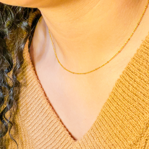
                  
                    Lainee in Gold Necklace
                  
                